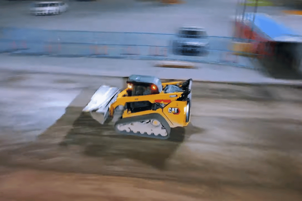 Paving contractor compacting asphalt with a roller for a durable surface.